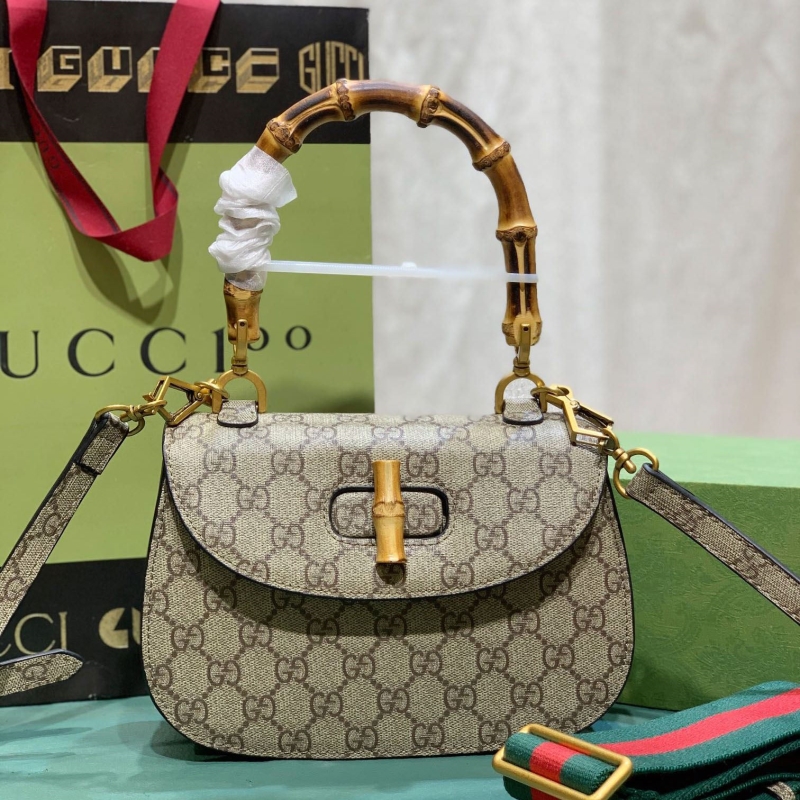 G*u*i top handle bags